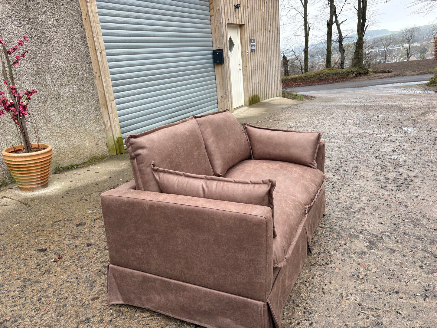 Small 2 seater Brown Leather Sofa - Perfect for a rental property