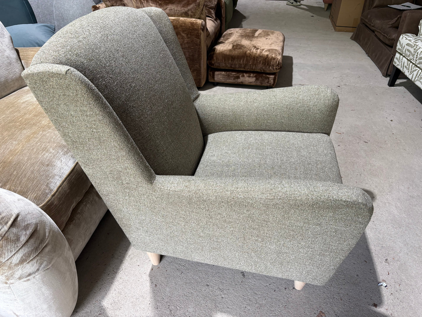 New end of season armchair in Moss Green fabric