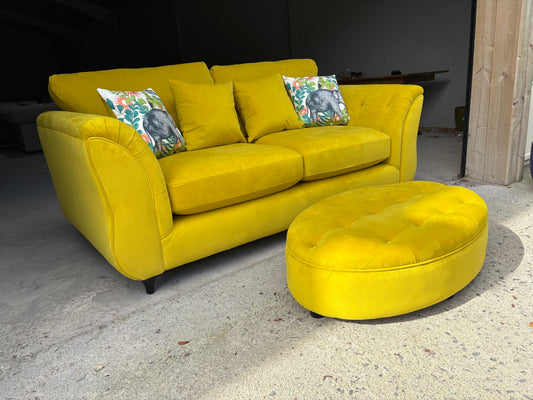 Stunning yellow velvet sofa and footstool