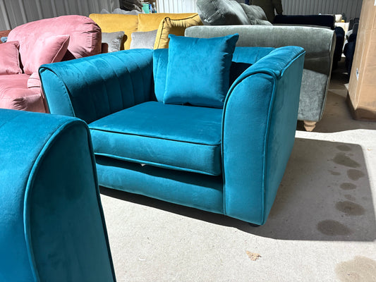 Teal velvet cuddler armchair