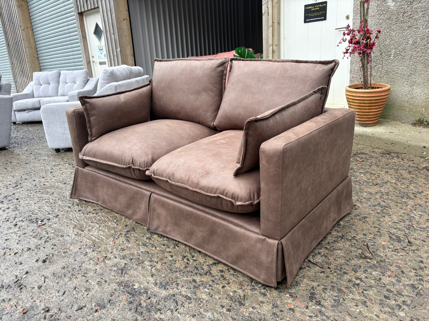 Small 2 seater Brown Leather Sofa - Perfect for a rental property