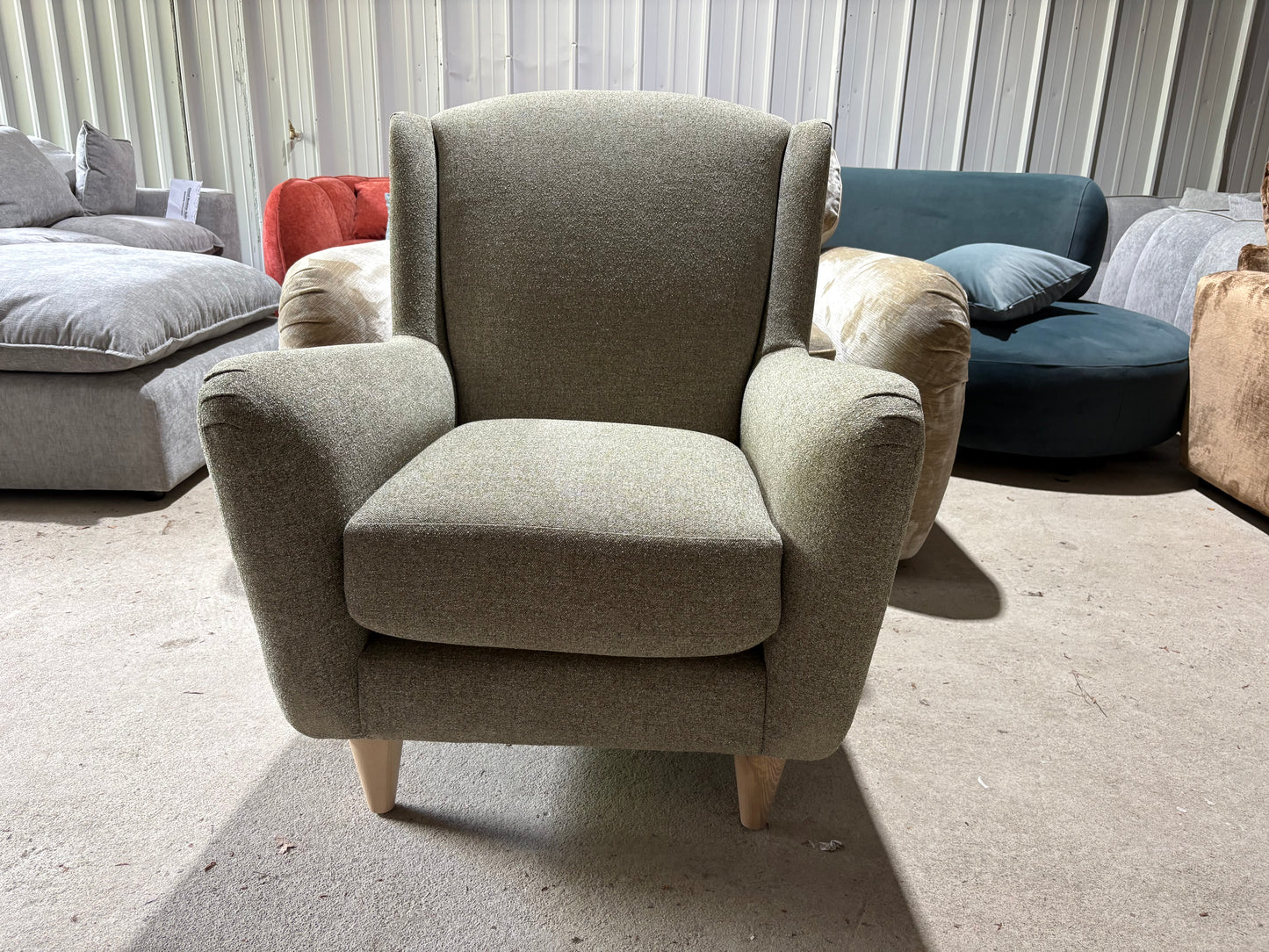 New end of season armchair in Moss Green fabric