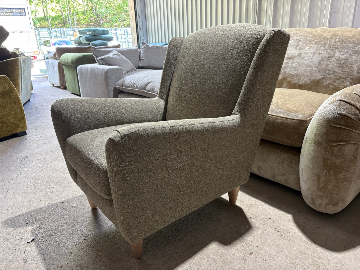 New end of season armchair in Moss Green fabric